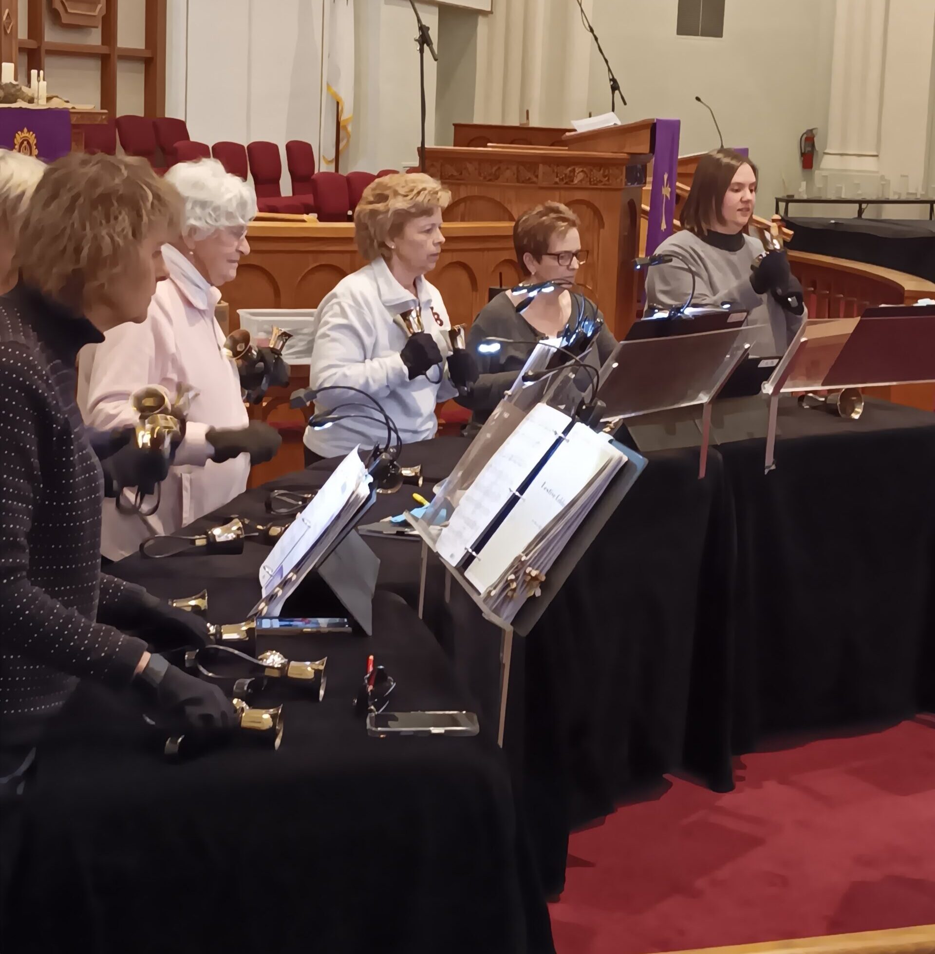 Handbell choir practice in sanctuary of St. Andrews church in Findlay, OH
